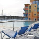 Shared pool area overlooking the Marina de Albufeira"